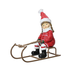 Decoris Polyresin Girl on Iron Sleigh 12cm